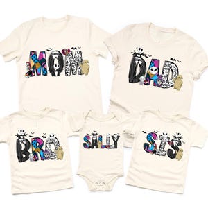 a collection of white t-shirts with various names and characters printed on them, including the characters from the movie " Nightmare Before Christmas".