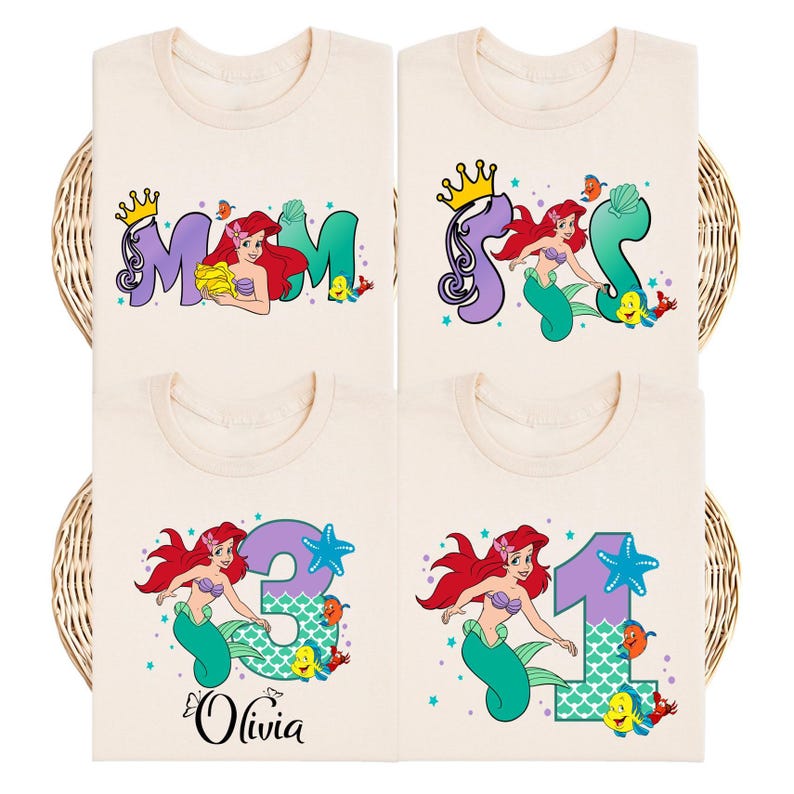 four t-shirts with the same design featuring a mermaid character and the number 3.