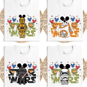 six white t-shirts with various Star Wars characters and designs printed on them.