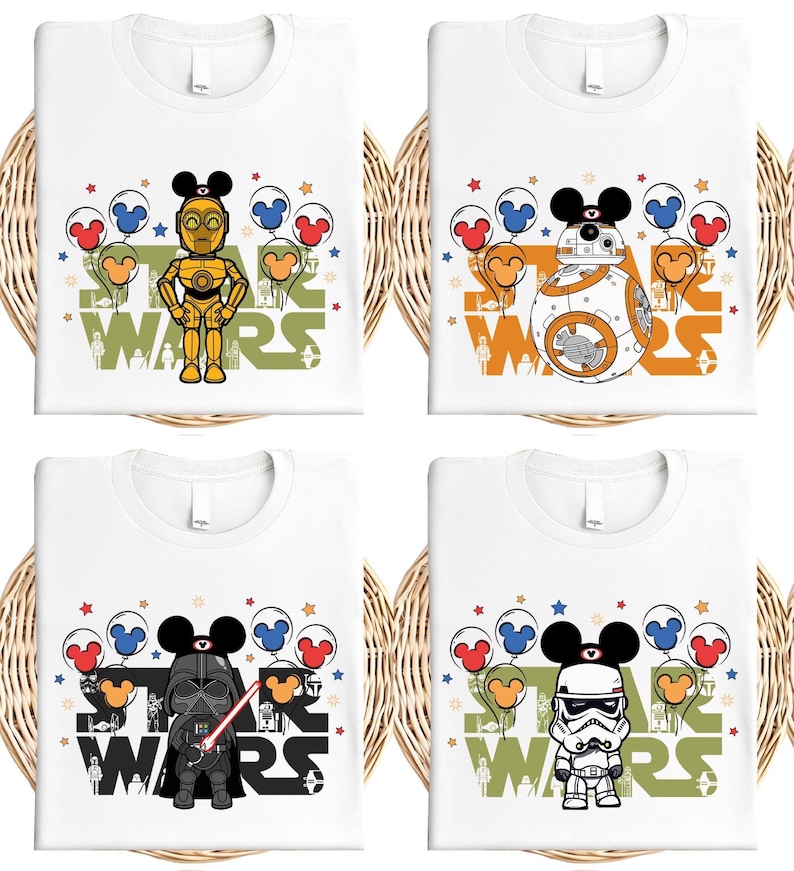 six white t-shirts with various Star Wars characters and designs printed on them.
