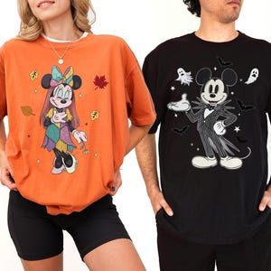 two people wearing t-shirts with cartoon characters on them.
