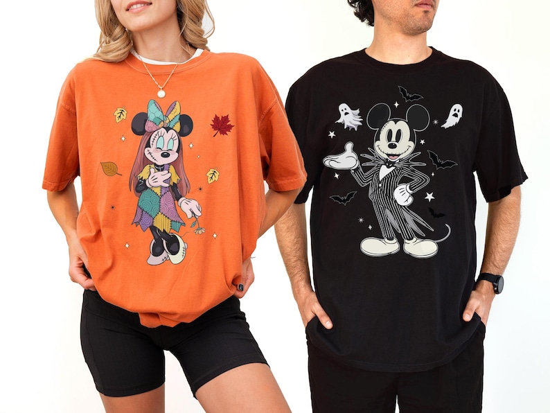 two people wearing t-shirts with cartoon characters on them.