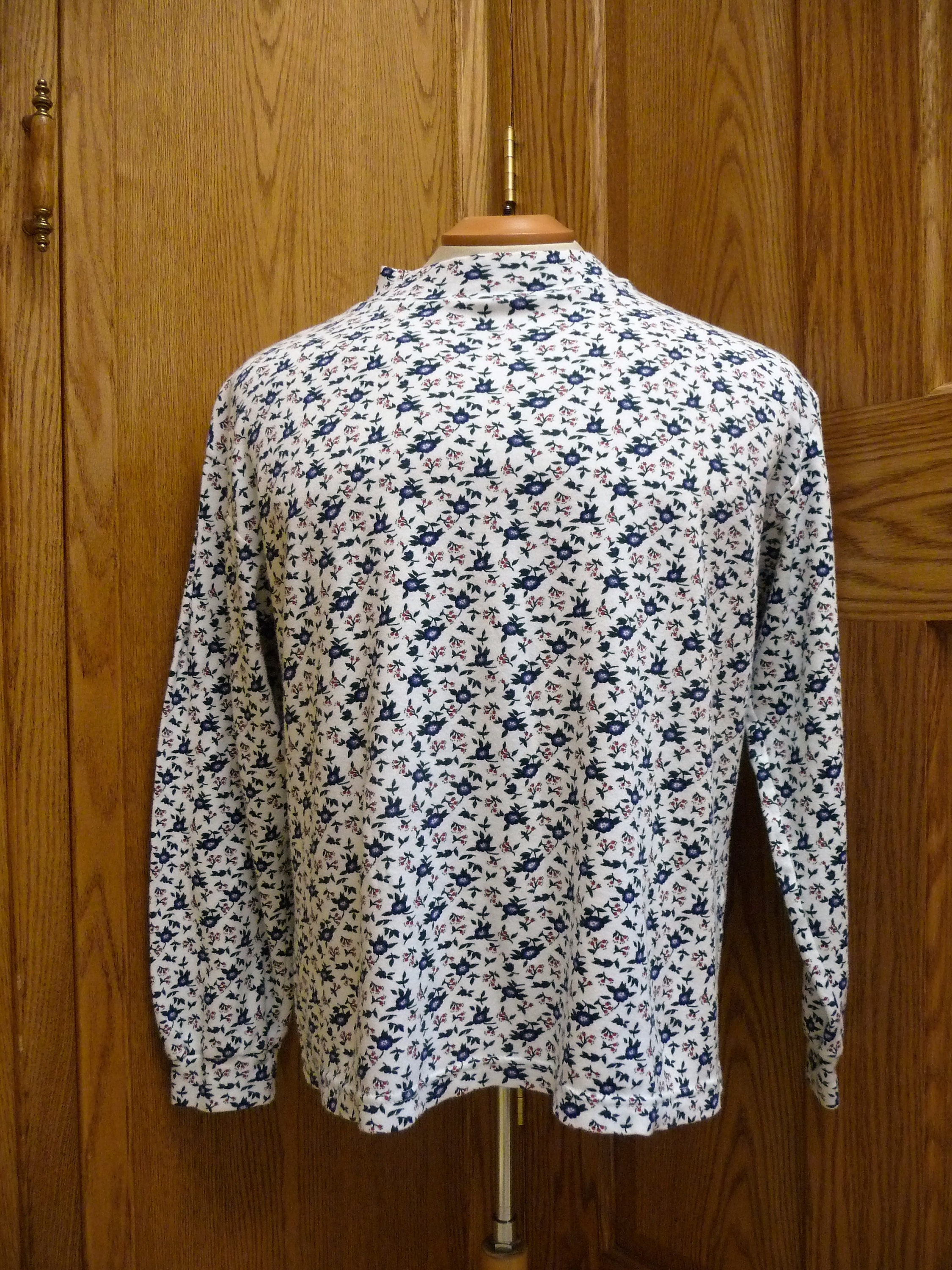 white floral turtleneck