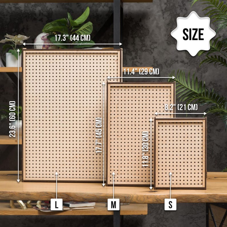 May include: Three wooden pegboards in different sizes, labeled "L", "M", and "S". The largest pegboard is 23.6 inches by 17.3 inches, the medium pegboard is 17.7 inches by 11.4 inches, and the smallest pegboard is 11.8 inches by 8.2 inches.