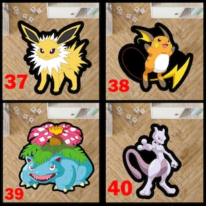 May include: Four character-shaped rugs featuring Jolteon, Raichu, Venusaur, and Mewtwo. Each rug has a thick black border and is labeled with a red number: 37 for the yellow electric type, 38 for the orange mouse, 39 for the floral creature, and 40 for the purple bipedal figure.