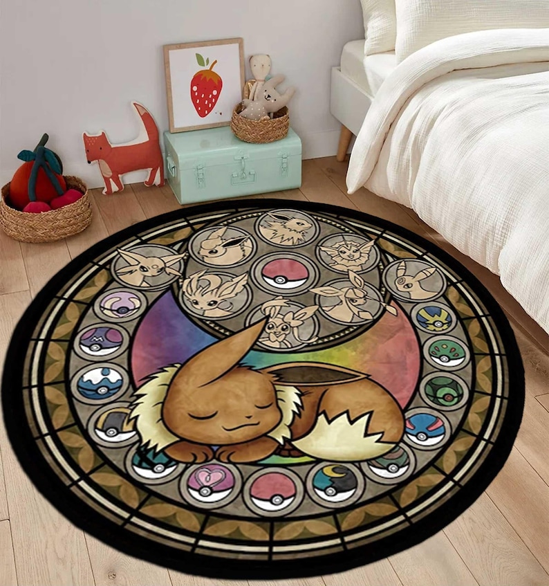 May include: A round area rug featuring a stained glass style design with a central sleeping brown Eevee character. The border contains circular frames displaying various Eevee evolutions and colorful Pok&eacute; Ball icons against a rainbow background.