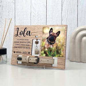 May include: Wooden pet memorial frame with a photo of a dog, a small glass vial, and a dog collar. The frame includes the name "Lola", the years 2010-2024, and the text "I LOVED YOU YOUR WHOLE LIFE, I WILL MISS YOU THE REST OF MINE."