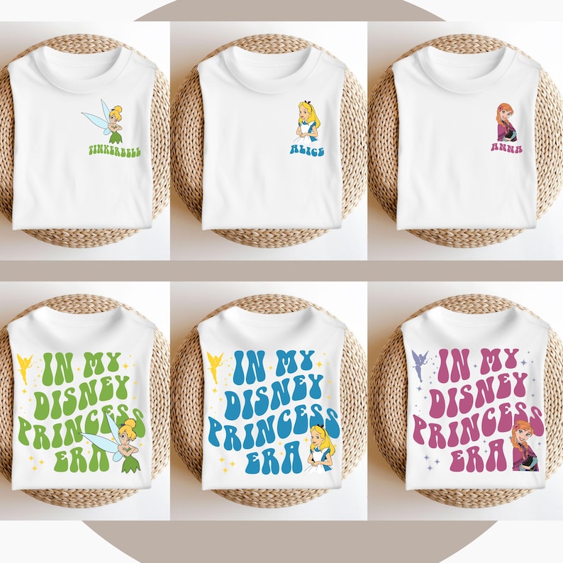 May include: Six white t-shirts with different Disney princess designs. The shirts feature Tinkerbell, Alice, and Anna. The text on the shirts says "In My Disney Princess Era".