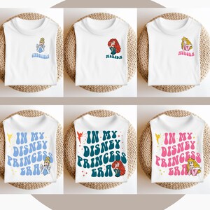 May include: Six white t-shirts with different Disney princess designs. The shirts feature Cinderella, Merida, Aurora, and the text "In My Disney Princess Era" with each princess.
