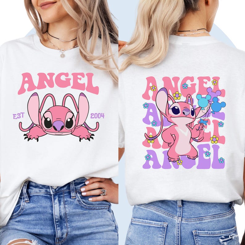 May include: White t-shirt with a pink cartoon character holding balloons. The character is surrounded by the word "ANGEL" in purple and pink letters. The text "EST 2004" is printed on the left side of the shirt.