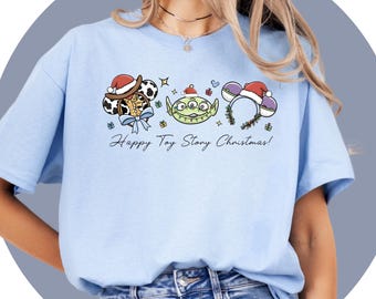 トイ・ストーリーのクリスマスTシャツ、バズ・ライトイヤーのホリデーTシャツ、ディズニー／ピクサーのキャラクター、ファミリー向けアパレル