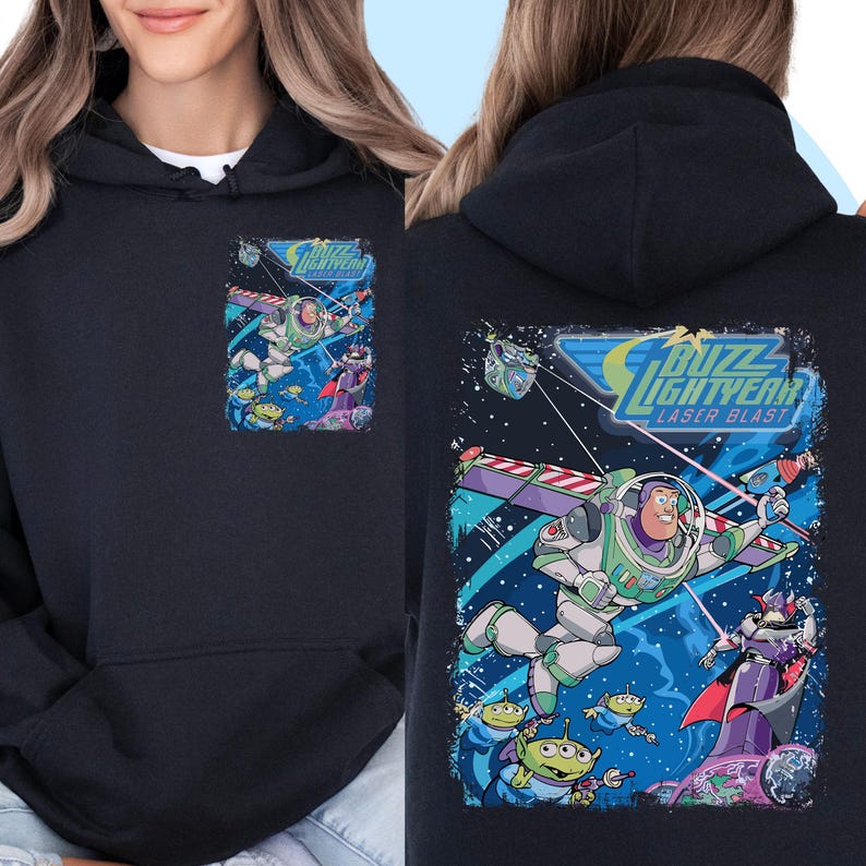 May include: Black hoodie with a graphic print of Buzz Lightyear from the Toy Story franchise. The graphic features Buzz Lightyear in a space scene with the text "Buzz Lightyear Laser Blast".