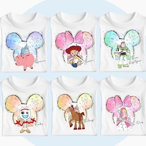 May include: Six white t-shirts with colorful Mickey Mouse ears and different Toy Story characters inside the ears. The characters are Hamm, Jessie, Buzz Lightyear, Forky, Bullseye, and Bo Peep. Each shirt has the character's name written below the ears.