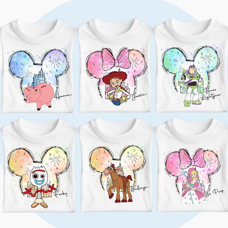 May include: Six white t-shirts with colorful Mickey Mouse ears and different Toy Story characters inside the ears. The characters are Hamm, Jessie, Buzz Lightyear, Forky, Bullseye, and Bo Peep. Each shirt has the character's name written below the ears.