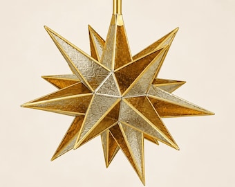 May include: A multi-pointed star-shaped hanging light fitting featuring alternating panels of textured gold and silver glass. The geometric structure is framed in thin gold metal trim and suspended from a matching gold metal chain.