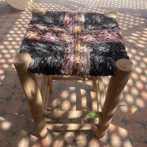 Small Moroccan stool made of wood and Boucherouit