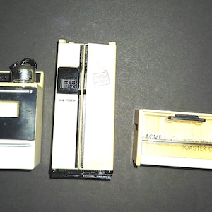 Vintage Acme-koelkastmagneten 1992: oven, koelkast, broodrooster