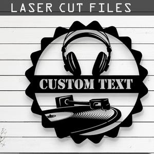 May include: Black and white laser cut file design of a turntable with headphones and the text "CUSTOM TEXT". The design is in a circular shape with a starburst border. The file is available in CDR, AI, SVG, DXF, and PDF formats.