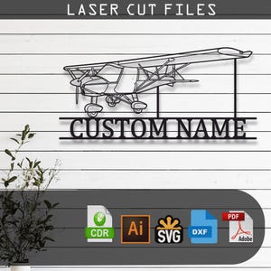 May include: A black laser cut file design featuring a light aircraft silhouette positioned above the text CUSTOM NAME. The digital file set includes icons for CDR, Ai, SVG, DXF, and PDF formats, displayed against a white horizontal plank background.
