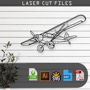 Puede incluir: Una ilustración en blanco y negro de un avión pequeño. La imagen está etiquetada como "Archivos de corte por láser" e incluye los formatos de archivo: CDR, AI, SVG, DXF y PDF.