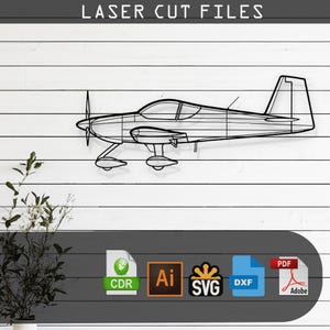 May include: Black metal airplane wall art. The laser-cut design features a detailed outline of a propeller plane. The image includes the text "LASER CUT FILES" at the top and file type icons at the bottom.
