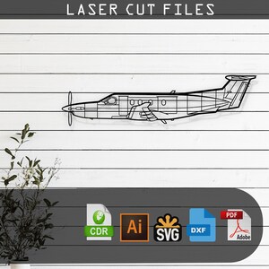 May include: Black and white line art illustration of a single-engine turboprop aircraft. The image is labeled "LASER CUT FILES" and includes file formats: CDR, AI, SVG, DXF, and PDF.