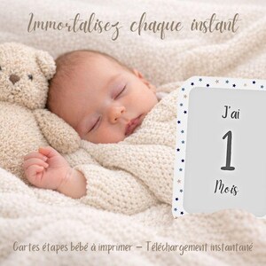 May include: A sleeping baby wrapped in a cream-colored blanket, next to a stuffed teddy bear. A card displays the text "I'm 1 month old" with star accents. The image also includes the text "Immortalize every moment" and "Printable baby milestone cards - Instant download."