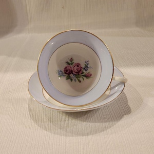 Vintage Blue Banded Floral Bone China Tea Cup and Saucer Marked England.