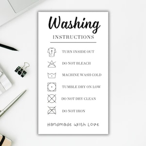 May include: A black and white printable washing instructions card with the text "Washing Instructions" and a list of instructions including "Turn inside out", "Do not bleach", "Machine wash cold", "Tumble dry on low", "Do not dry clean", and "Do not iron". The card also includes the text "Handmade with Love".