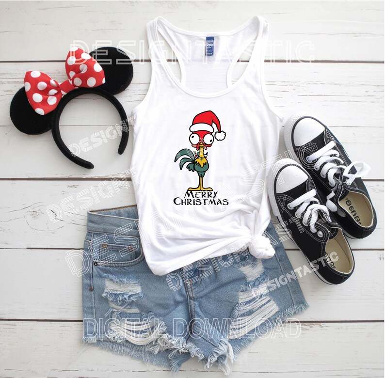 May include: White vest top featuring a cartoon rooster in a Santa hat with the words "MERRY CHRISTMAS". The image also shows denim shorts, black trainers, and a black headband with red polka dot ears.
