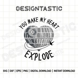 May include: A black and white graphic design featuring a heart-shaped Death Star with the text "You Make My Heart Explode." A small spaceship flies around the heart. The word "DESIGNTASTIC" is at the top.