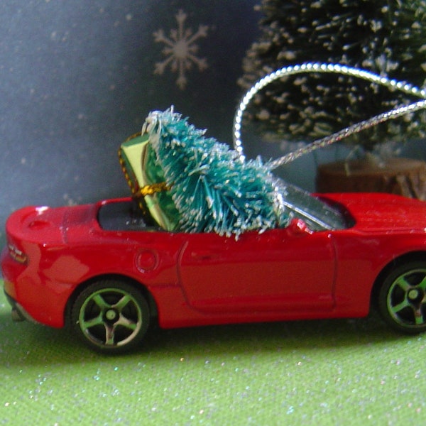 2016 Red Chevy Camaro Convertible car with Christmas tree ornament