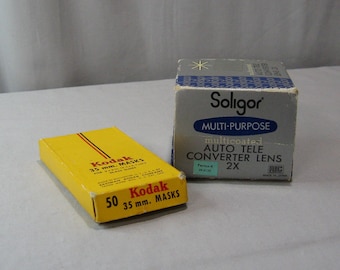 Vintage Soligor-cameralens en Kodak 35 mm-maskers