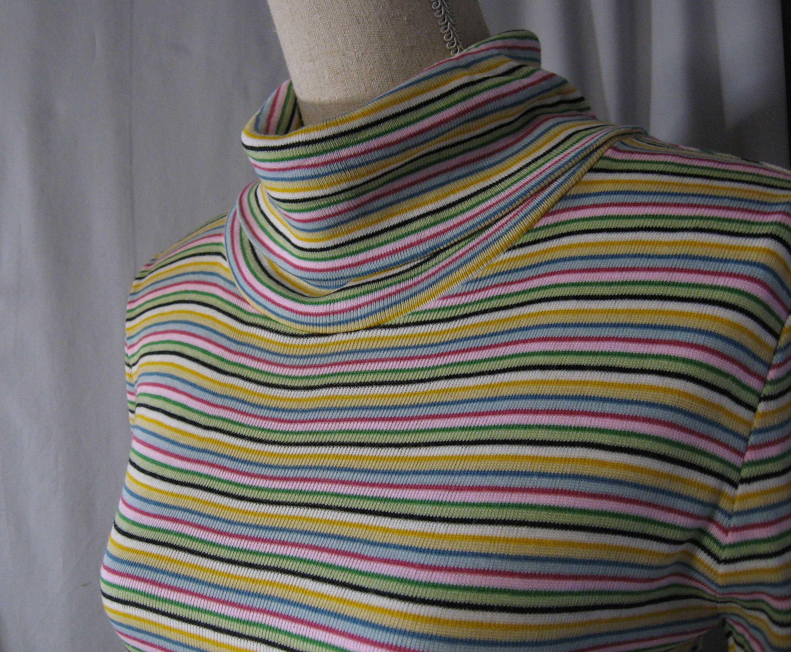 colourful striped turtleneck