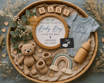May include: A baby announcement arrangement featuring a wooden frame with text, a blue onesie, a wooden bottle, a crochet teddy bear, and baby booties. The announcement includes the text "Baby Boy is on the way!" and "Arriving July 2025."