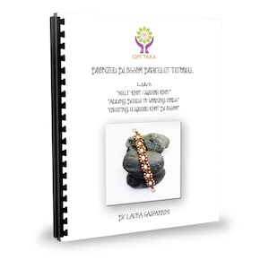 May include: A spiral-bound tutorial titled "Bronzed Blossom Bracelet Tutorial" with the Om Tara logo. The tutorial includes instructions on half knot/square knot, adding beads, and creating a square knot blossom. A bracelet with bronze and white beads is shown.