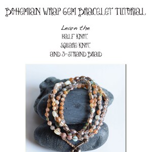 May include: A multi-strand wrap bracelet with various earth-toned beads, including orange, brown, and cream colors. The bracelet is displayed on a dark gray stone. The image also includes text that reads "Bohemian Wrap Gem Bracelet Tutorial."