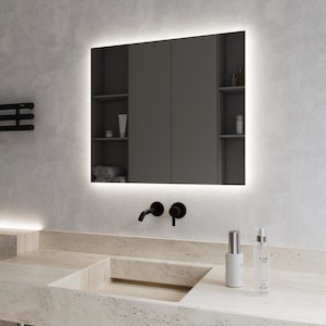 May include: A modern bathroom vanity with a white countertop and a built-in sink. The vanity features a black faucet and a large rectangular mirror with integrated LED lighting. Two bottles of skincare products are on the countertop.