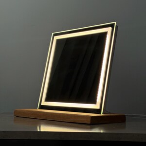 Thick premium mirror glass close-up with polished edge detail and solid construction