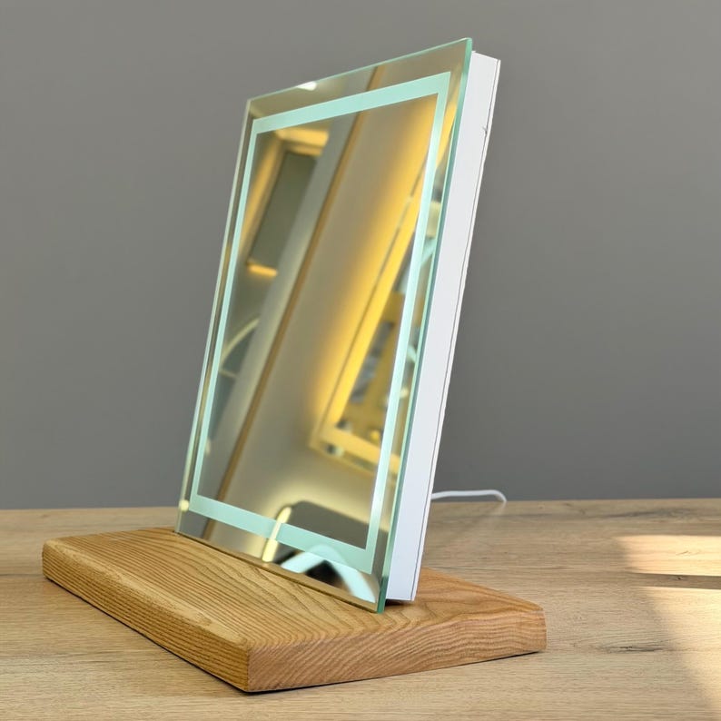 Modern standing mirror with minimalist  base for vanity or makeup table