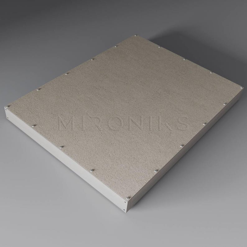 May include: A rectangular, light gray, textured surface with a white border and the word "MIRONIKS" printed in black. The surface is held in place by small silver screws.