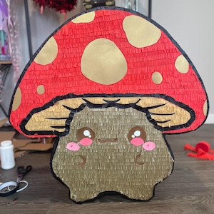 Custom personalized piñata. Number piñata, character piñata, and different designs. Mushroom kawaii piñata