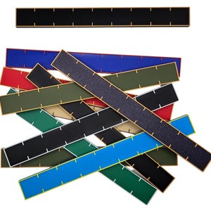 May include: A set of ten rulers in various colors, including black, blue, green, red, and beige. Each ruler has a black and white scale with gold trim.