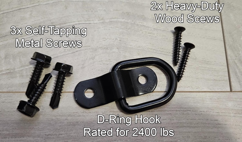 May include: A black metal D-ring hook rated for 2400 lbs, with three self-tapping metal screws and two heavy-duty wood screws.