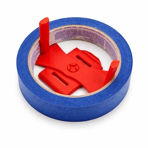 May include: A roll of blue painter's tape with red plastic corner protectors. The tape is a vibrant blue color, and the red protectors are designed to fit inside the tape roll. This product is for painting projects.