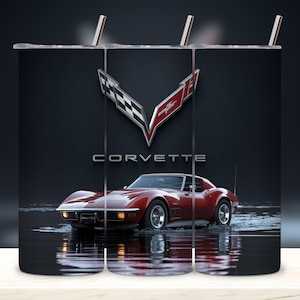 May include: A red Corvette sports car is depicted on a tumbler. The Corvette logo is above the car, with the word "CORVETTE" below. The background is dark, with reflections of the car in water.