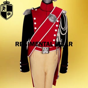 May include: A red and black military uniform with white trim and gold buttons. The uniform features a red sash with a gold emblem and a black and white rope trim. The text "REGIMENTAL WEAR" is visible on the image.