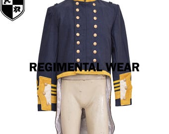 May include: A navy blue military jacket with gold buttons and trim. The jacket has a tailcoat style and features a high collar. The jacket is worn by a mannequin.