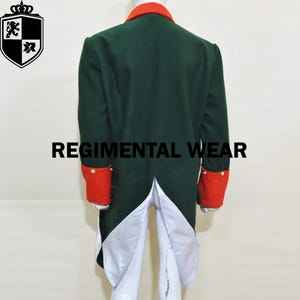 The American Continental Army often wore green coats with different colored facings, though many soldiers, especially militia, wore simple 
hunting shirts made from homespun fabric. Uniform is in wool fabric, red wool cuffs and collar.