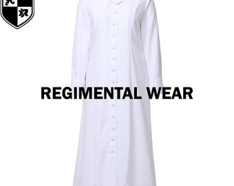 May include: A white long-sleeved robe with a red cross on the chest. The robe has a button-up front and a long, flowing skirt. The text "REGIMENTAL WEAR" is printed in black letters below the robe.